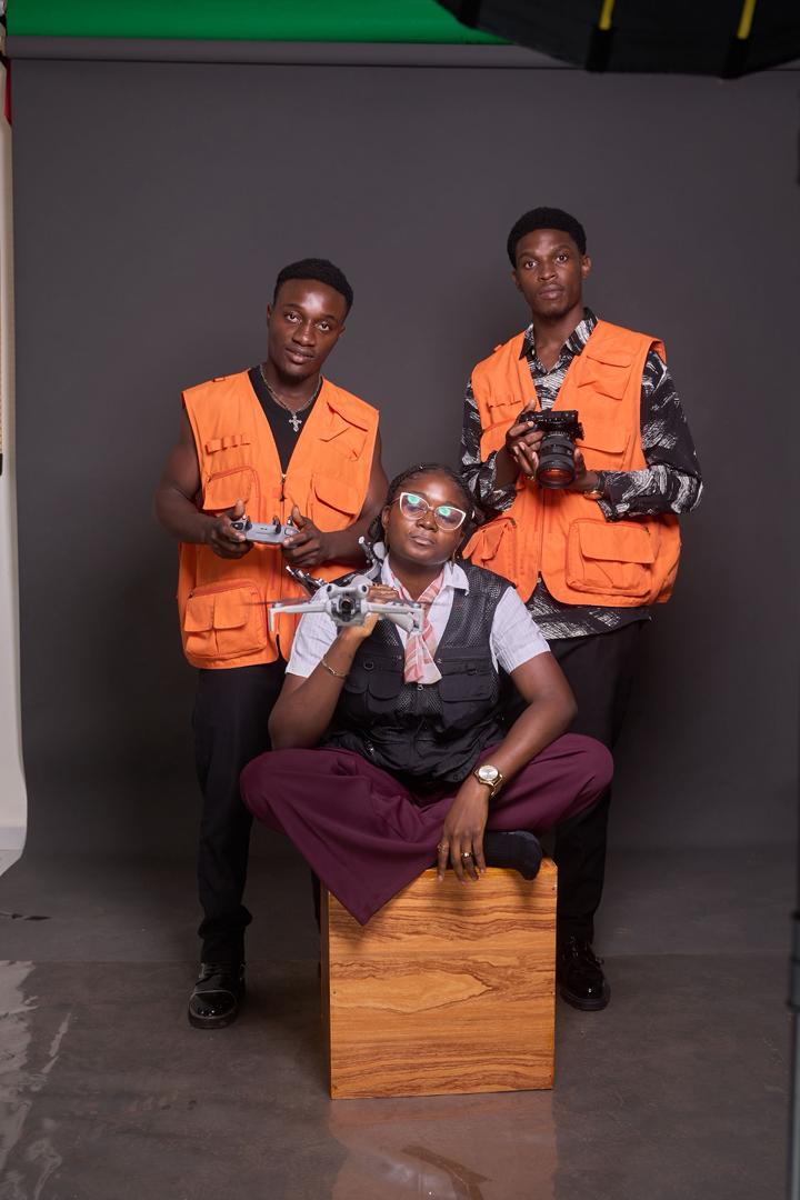 New Vision Creatives photography and videography team with camera and drone equipment