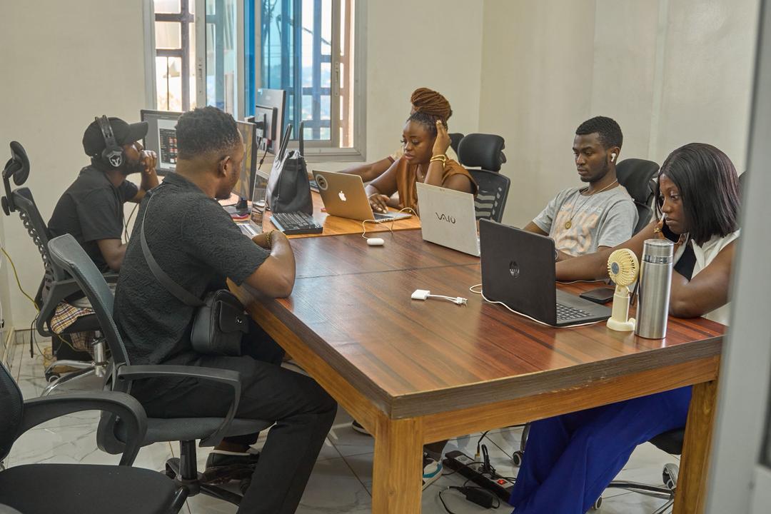 New Vision Creatives team in a collaborative working session